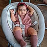 Venus joined the competition — help win amazing prizes! baby, sleeping, baby_rocker, infant, pink_clothing, headband, knee_socks, wooden_floor, indoor, child, straps, furniture, seat, relaxing, peaceful, person, cute, resting, toddlers, home