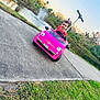 adventure, baby, bumper, car, face, fun, head, leisureactivities, machine, person, racecar, roadtrip, selfie, sitting, slope, sport, transportation, vacation, vehicle, wheel