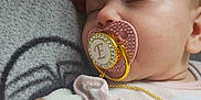 Elizabeth joined the competition — help win amazing prizes! baby, blanket, chain, child, closeup, cozy, cute, face, head, indoors, infant, pacifier, peaceful, pink_clothing, portrait, resting, skin, sleeping, soft_texture, spiderman