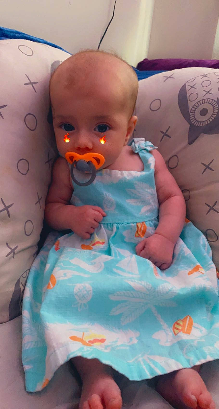 Brealynn is registered to the contest to win money with this photo: azure, baby, baby_products, baby_toddler_clothing, child, comfort, day_dress, dress, fun, linens, magenta, pattern, person, pink, purple, room, sitting, skin, sleeve, textile