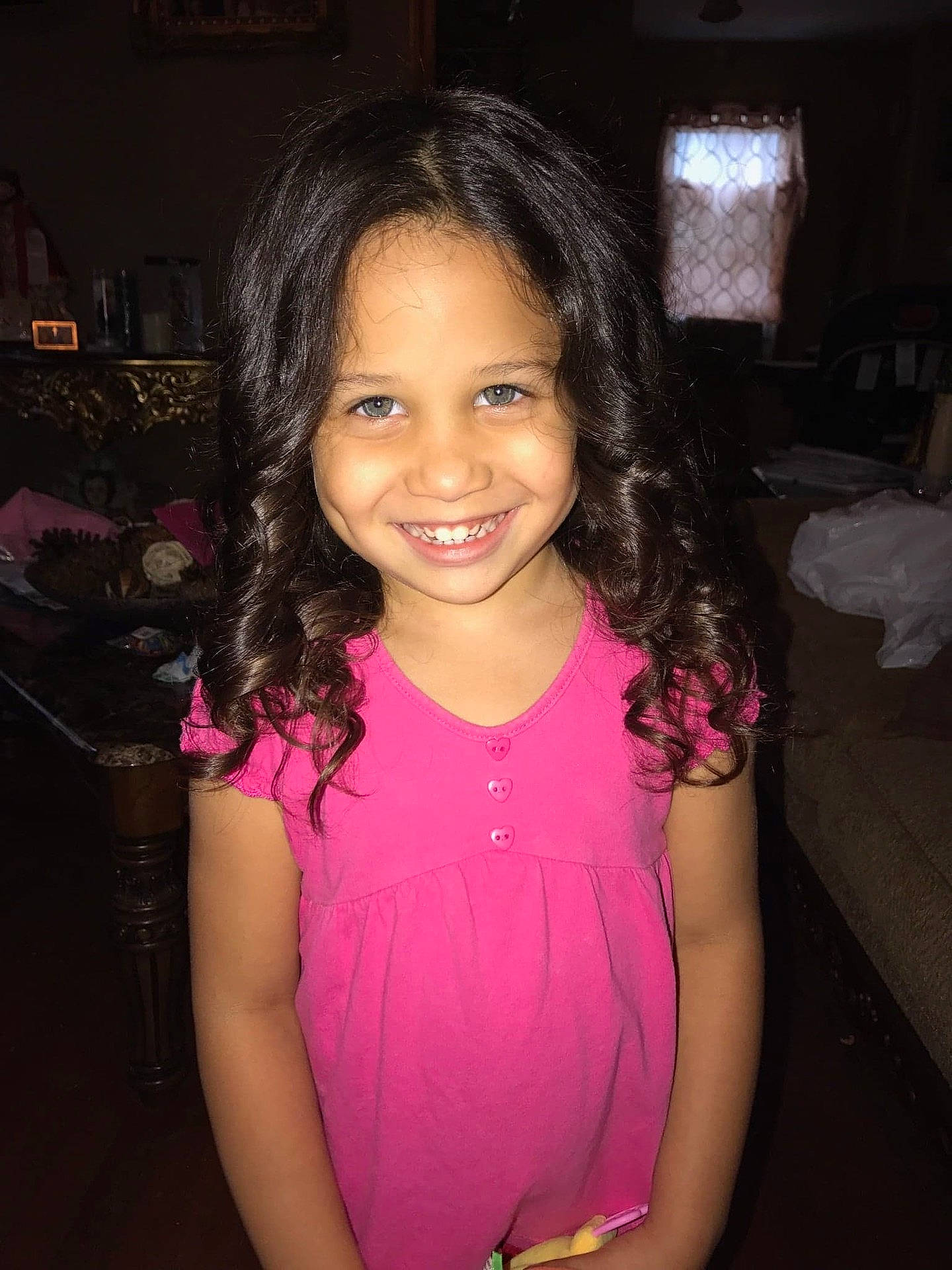 Mafalda is registered to the contest to win money with this photo: beauty, black_hair, cheek, child, chin, day, emotion, eye, face, facial_expression, fun, girl, hair, hairstyle, human_hair_color, joy, lady, person, pink, shoulder