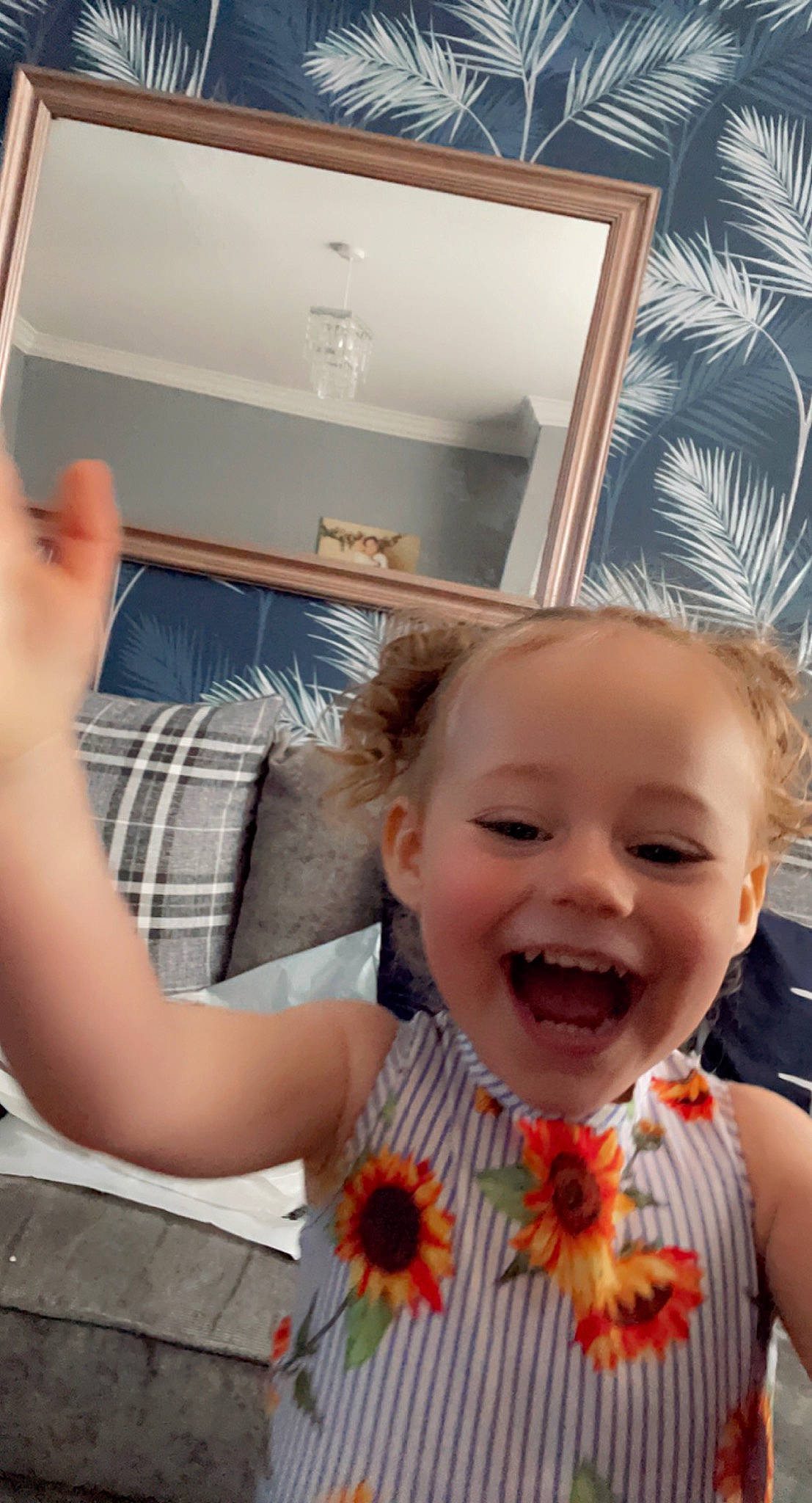 Bethany is registered to the contest to win money with this photo: blond, child, finger, flower, fun, gesture, happy, joy, laugh, leisure, linens, pattern, person, petal, room, selfie, shoulder, sitting, smile, t_shirt