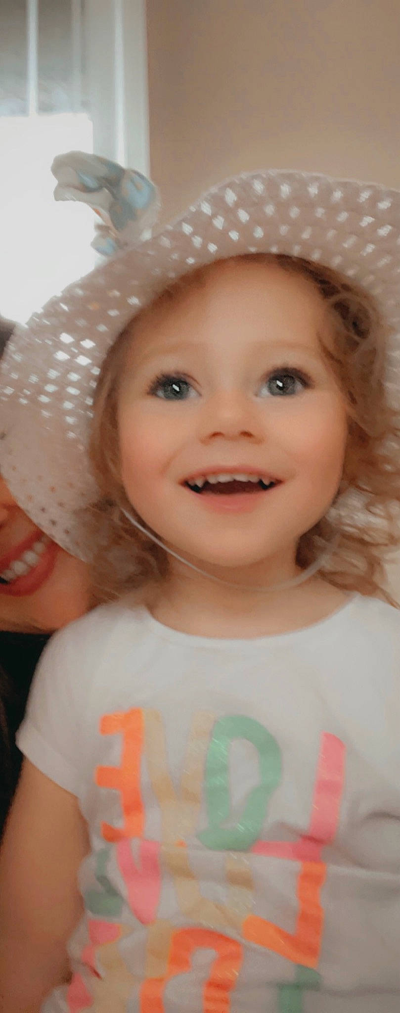 Bethany is registered to the contest to win money with this photo: cap, cheek, chin, clothing, eye, eyebrow, eyelash, flash_photography, happy, hat, iris, joy, lip, nose, organ, person, photograph, pink, skin, smile