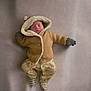 Joel is registered to the contest to win money with this photo: baby, sleeping, hood, jacket, blanket, pajamas, infant, cozy, cute, child, soft, warm, clothing, gloves, striped_socks, newborn, relaxed, indoors, portrait, lying_down