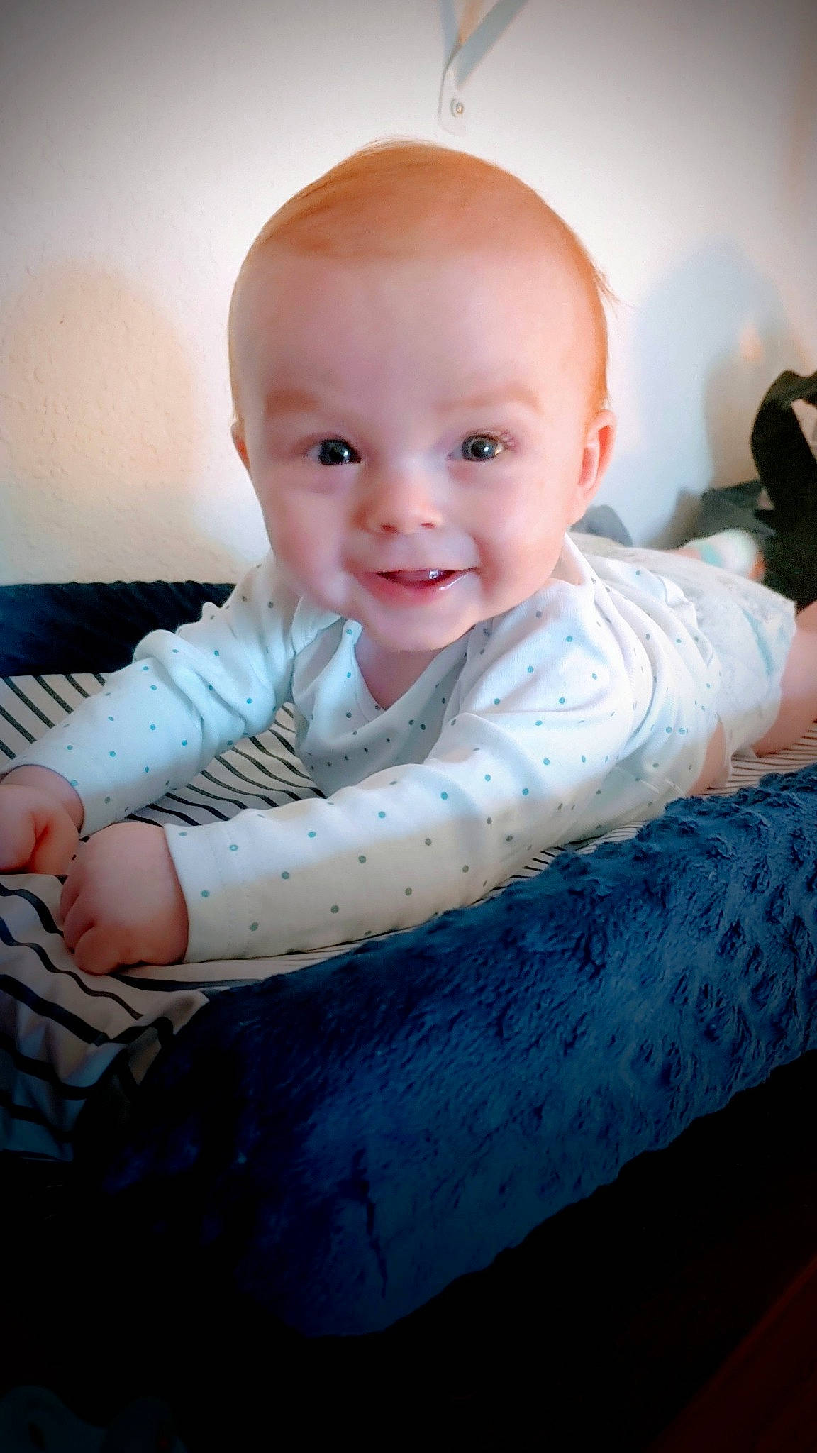 Tristan is registered to the contest to win money with this photo: azure, baby, baby_toddler_clothing, cheek, chin, comfort, eye, face, finger, flash_photography, gesture, hairstyle, happy, iris, joy, lip, mouth, person, product, skin