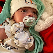Angel joined the competition — help win amazing prizes! baby, beanie, blanket, bonnet, cap, clothing, face, happy, hat, head, hood, newborn, person, photography, portrait, quilt, sleeping, smile, towel, yawning