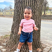 Yendelis joined the competition — help win amazing prizes! child, toddler, smiling, standing, tree_trunk, pink_shirt, denim_shorts, socks, slippers, outdoor, road, nature, playful, happy, person, cute, casual_clothing, daylight, young_child, fashion