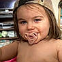 Harper is registered to the contest to win money with this photo: toddler, child, pacifier, cap, blue_eyes, face, smile, hair, indoors, person, skin, cute, baby, expression, portrait, young_child, cheek, headwear, closeup, casual