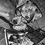Oréo a rejoint le concours — aidez-le/la à gagner de superbes lots ! dog, glasses, reading, magazine, black_and_white, close_up, pet, cute, indoor, laying_down, fur, animal, portrait, cozy, relaxed, floor, eyes, snout, ears, paw