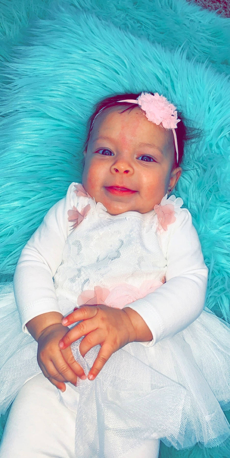 Janessa is registered to the contest to win money with this photo: baby, baby_products, cheek, child, fashion_accessory, hair_accessory, headband, headgear, nose, person, pink, product, skin, smile, toddler
