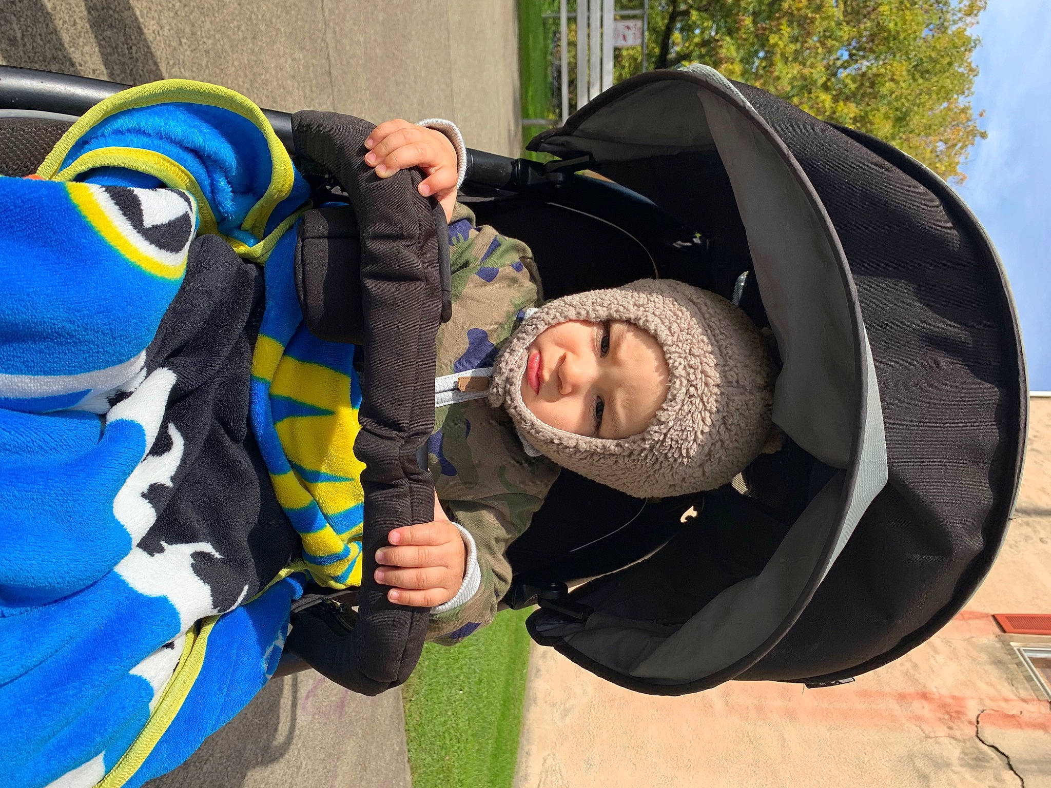 Ozias joined the competition — help win amazing prizes! baby_products, child, cool, costume, electric_blue, eyewear, fashion_accessory, fictional_character, fun, grass, headgear, headwear, hoodie, leisure, outerwear, person, personal_protective_equipment, recreation, sitting, toddler