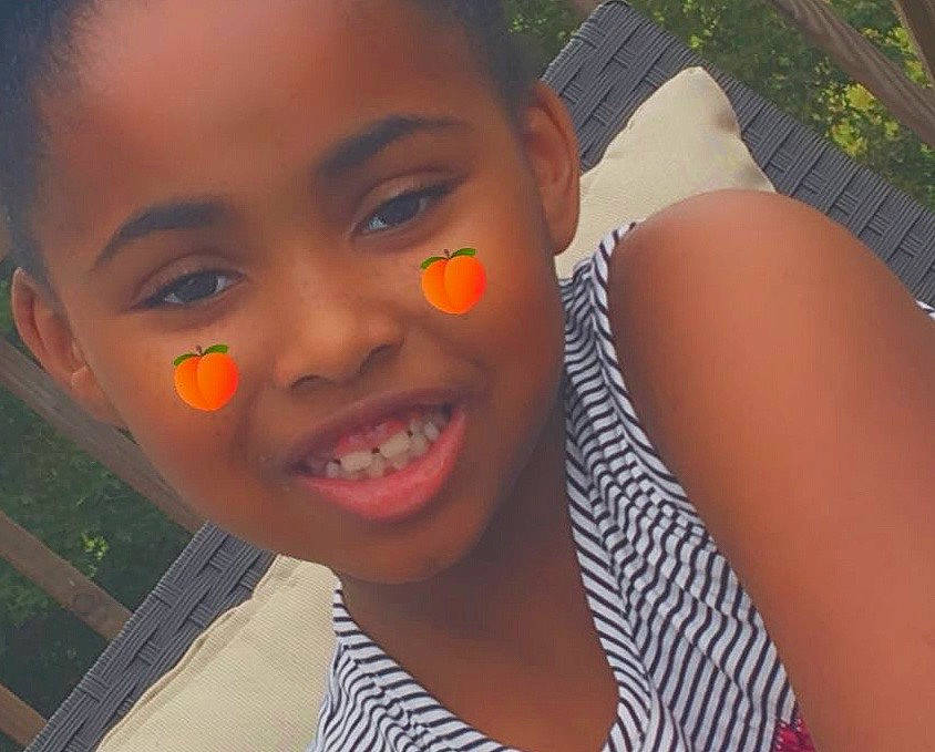 Leigh'Andra is registered to the contest to win money with this photo: black_hair, cheek, child, chin, cool, eyebrow, eyelash, flash_photography, forehead, happy, iris, jaw, joy, leisure, lip, mouth, neck, nose, orange, person