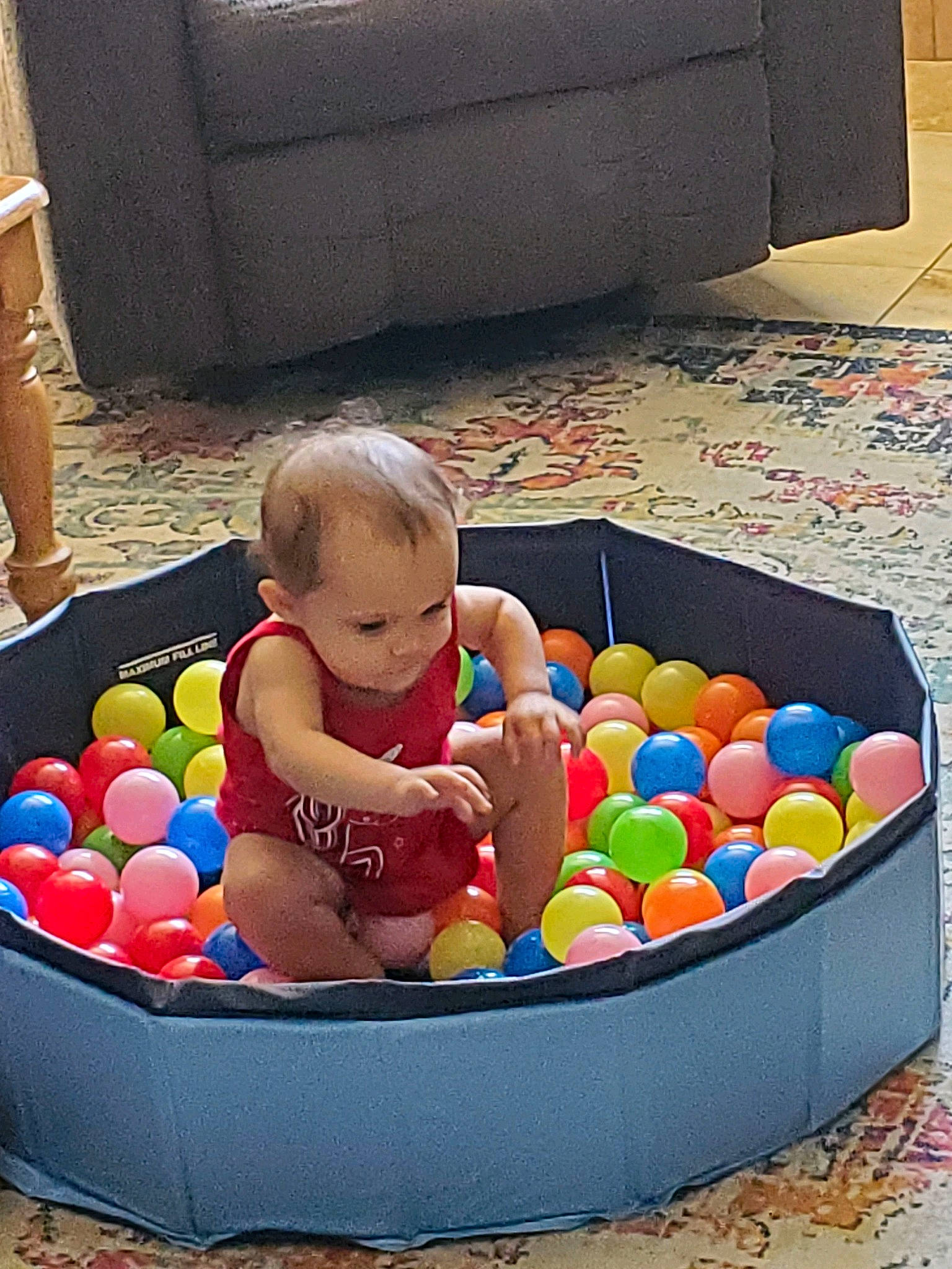 Victoria Mitchell is registered to the contest to win money with this photo: baby, baby_playing_with_toys, baby_products, baby_toys, ball, ball_pit, box, child, comfort, couch, fun, leisure, person, play, recreation, room, sitting, sports_toy, sweetness, toddler