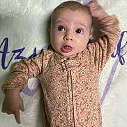 Azrael joined the competition — help win amazing prizes! baby, infant, onesie, floral_pattern, blanket, butterfly, flower, lying_down, curious, wide_eyes, soft_texture, hand_up, child, young, cute, indoors, portrait, sleepwear, comfortable, expression