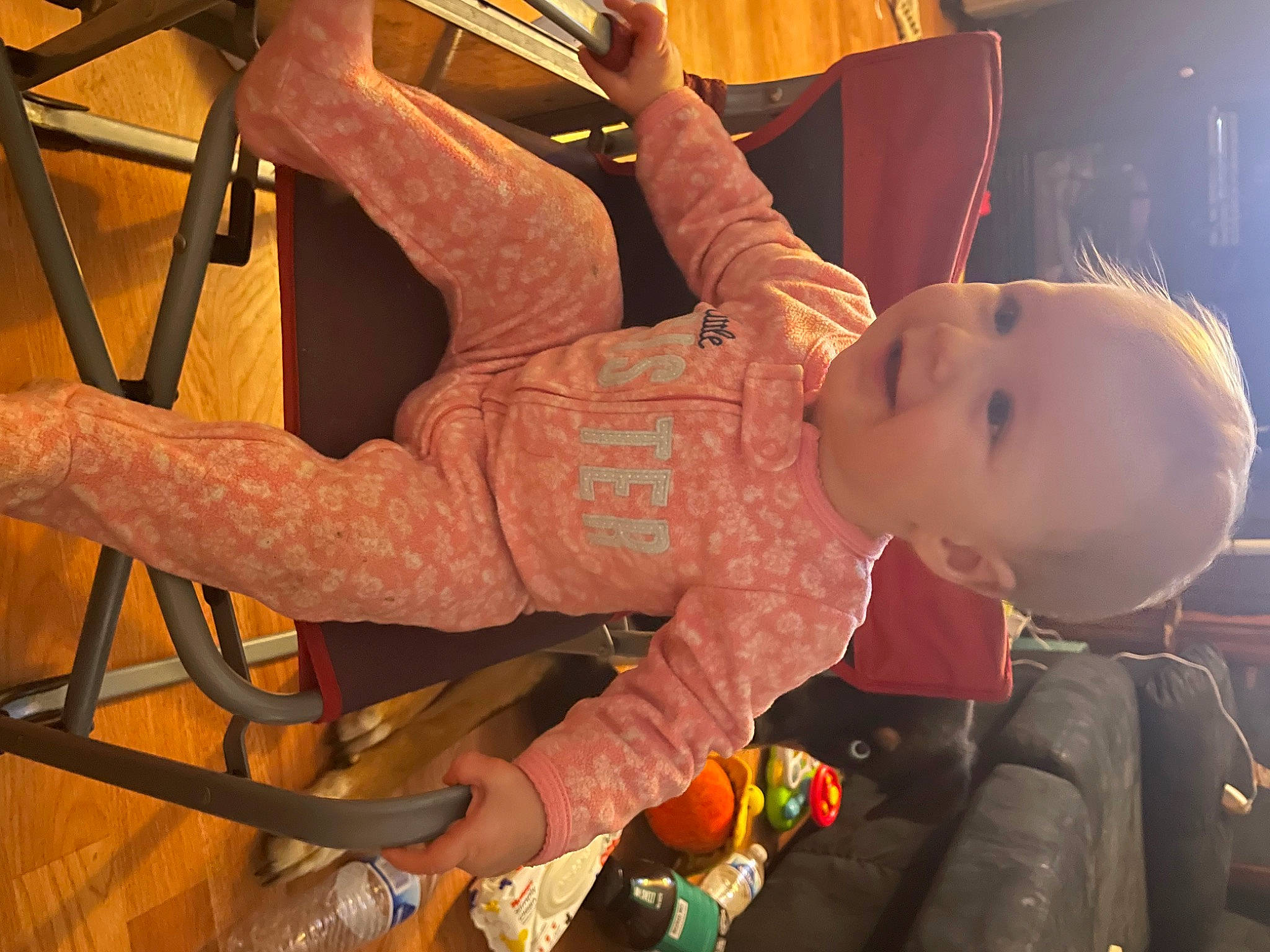 Madyson is registered to the contest to win money with this photo: abdomen, baby, baby_products, child, entertainment, event, fun, human_body, human_leg, knee, leisure, person, room, sitting, thigh, toddler, toy, tree, vacation