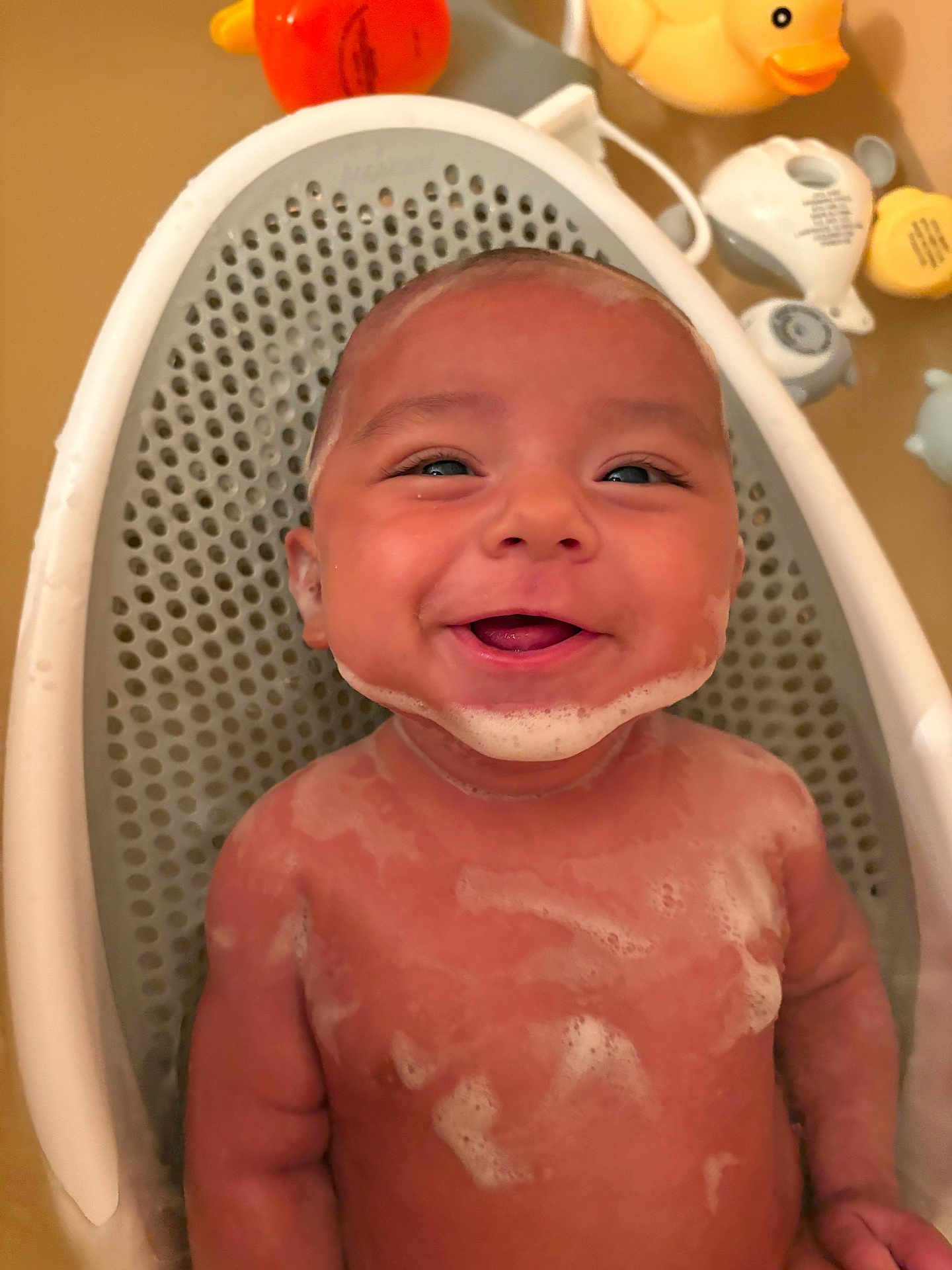 Milo joined the competition — help win amazing prizes! baby, bath, bubbles, smile, child, soapy, rubber_duck, toy, bathtub, water, happy, skin, face, head, infant, foam, cute, person, childhood, cleaning