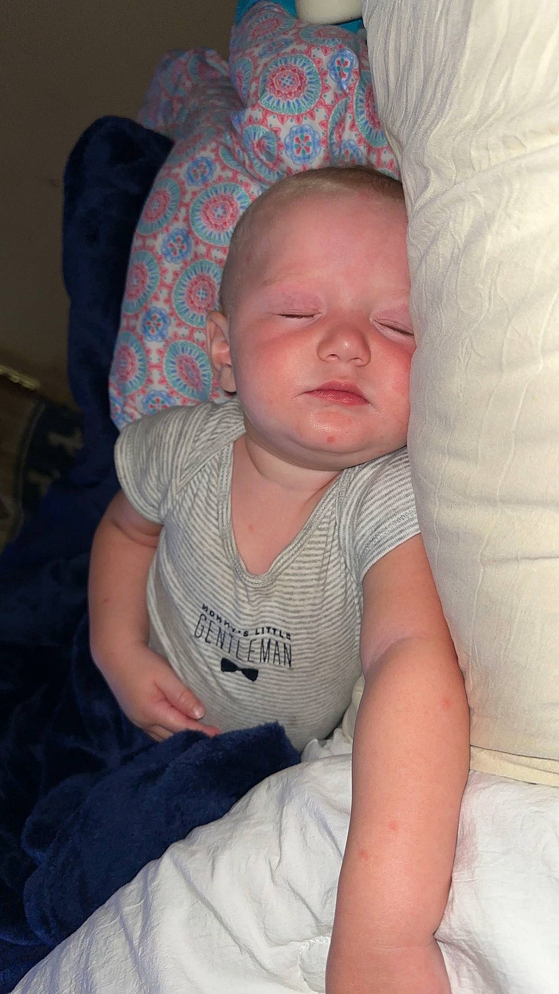 Braylon is registered to the contest to win money with this photo: baby, baby_toddler_clothing, cheek, chin, comfort, elbow, eye, face, finger, human_body, iris, leg, lip, mouth, nose, person, skin, sleeve, textile, toddler