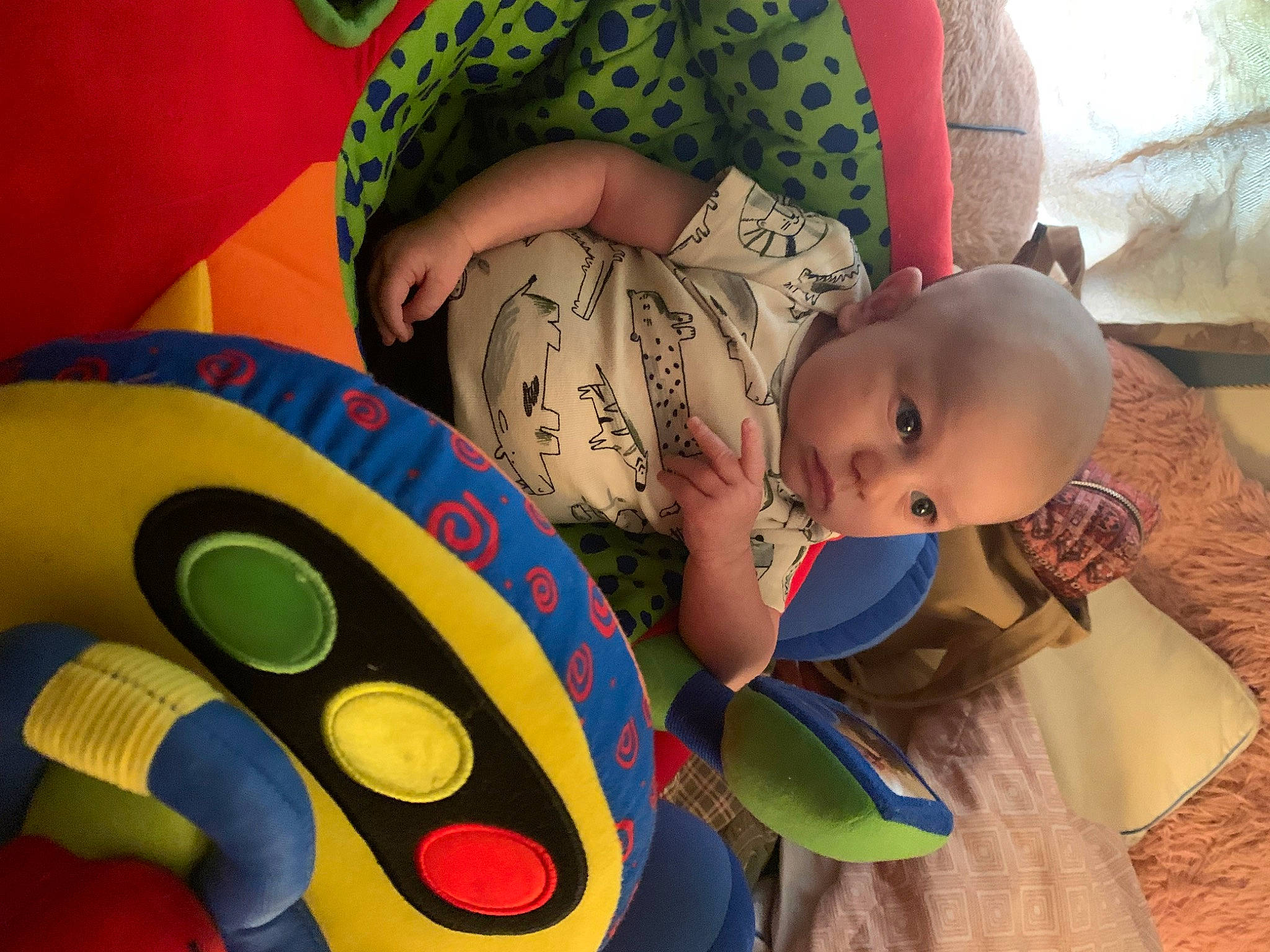 Hudson joined the competition — help win amazing prizes! arm, baby, baby_products, baby_toddler_clothing, child, circle, comfort, eye, facial_expression, fun, happy, head, leisure, linens, mouth, pattern, person, room, sitting, thigh