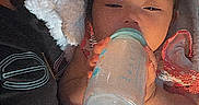 Gracelynn is registered to the contest to win money with this photo: baby, bottle, blanket, child, feeding, infant, milk, person, pink, sleepy, soft, toddler, young_child, cozy, comfort, cuddle, resting, indoor, warm, cute