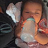 baby, bottle, blanket, child, feeding, infant, milk, person, pink, sleepy, soft, toddler, young_child, cozy, comfort, cuddle, resting, indoor, warm, cute