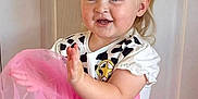 Darcey joined the competition — help win amazing prizes! toddler, child, girl, blonde_hair, pigtails, blue_eyes, clapping, smiling, pink_tutu, cow_print, sheriff_badge, dress_up, playful, indoor, door, happy, cute, fashion, person, portrait