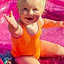 Darcey joined the competition — help win amazing prizes! toddler, child, swimsuit, orange, pink_pool, inflatable_pool, water, toy_doll, happy, smiling, blonde_hair, bows, summer, outdoor, splashing, sunlight, playtime, cute, baby, fun