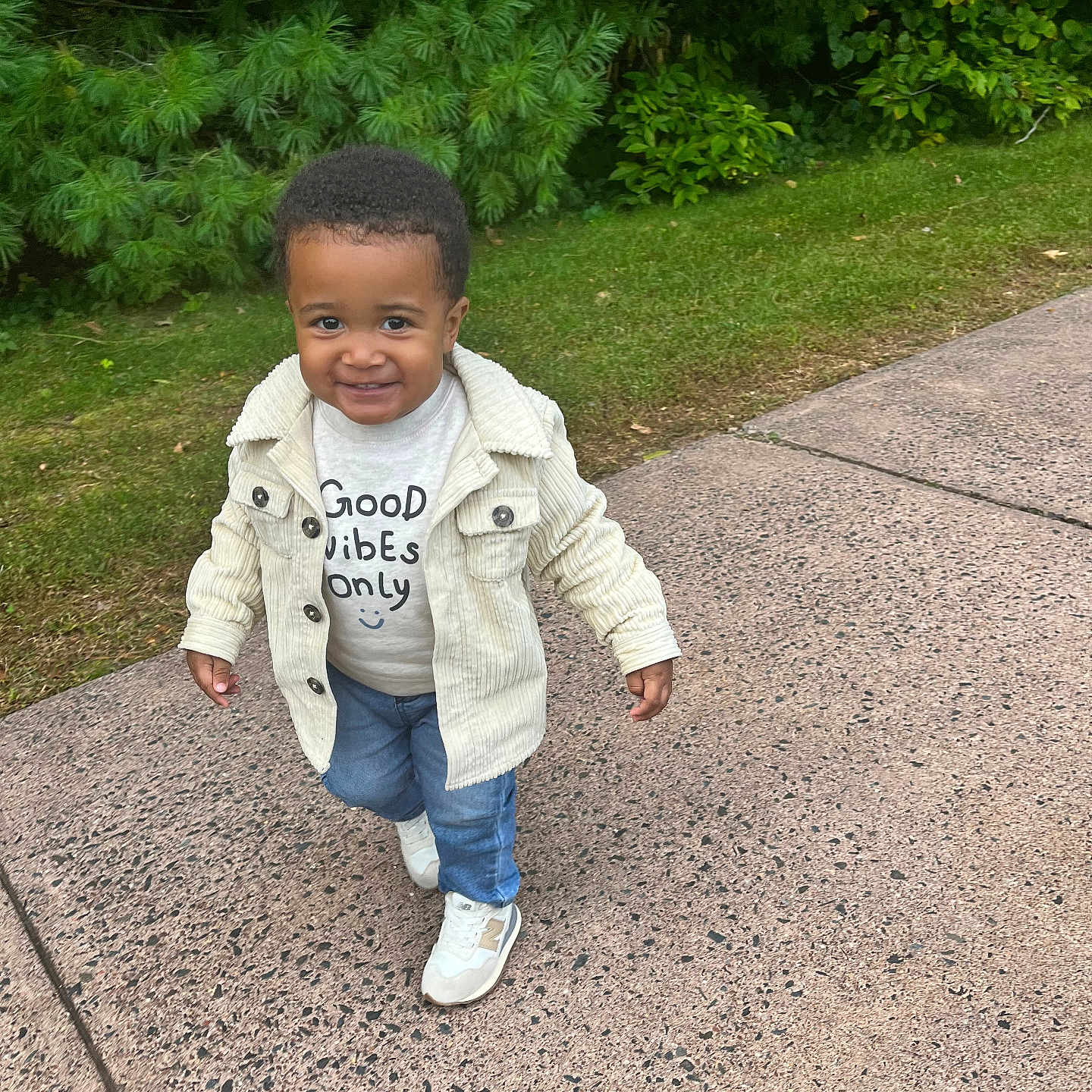 Daniel is registered to the contest to win money with this photo: blazer, boy, child, clothing, coat, face, grass, head, jacket, jeans, knitwear, longsleeve, male, pants, path, person, photography, plant, portrait, sleeve