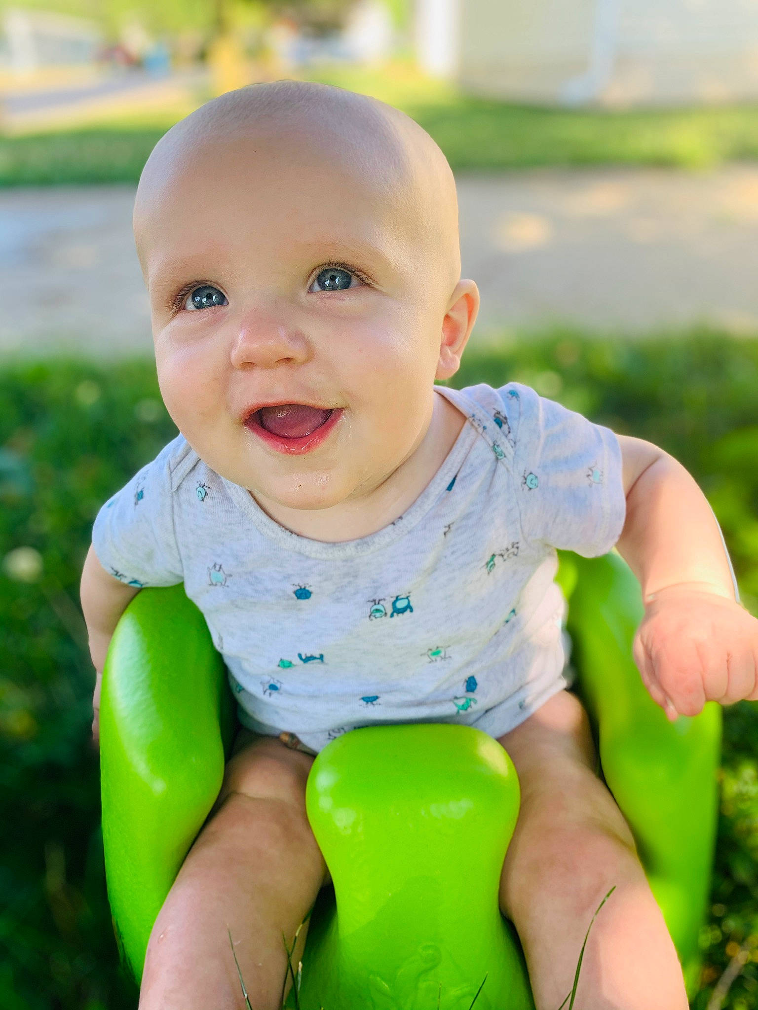 Saxton joined the competition — help win amazing prizes! baby, baby_playing_with_toys, baby_products, baby_toddler_clothing, child, fun, grass, green, happy, person, play, product, sitting, skin, smile, summer, toddler