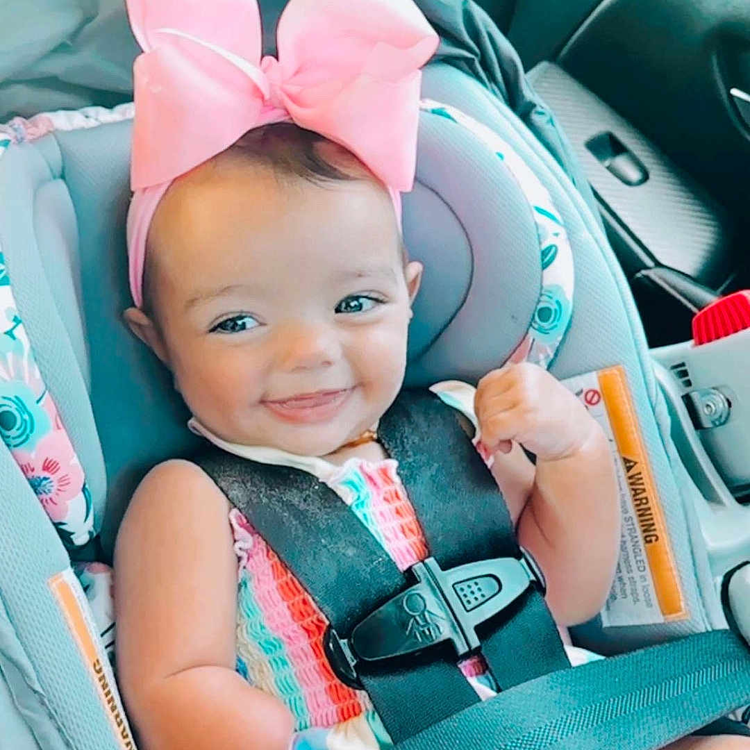 Allie joined the competition — help win amazing prizes! accessories, baby, babylaughing, belt, car, car_interior, carseat, clothing, cushion, face, happy, hat, head, homedecor, person, photography, portrait, smile, transportation, vehicle