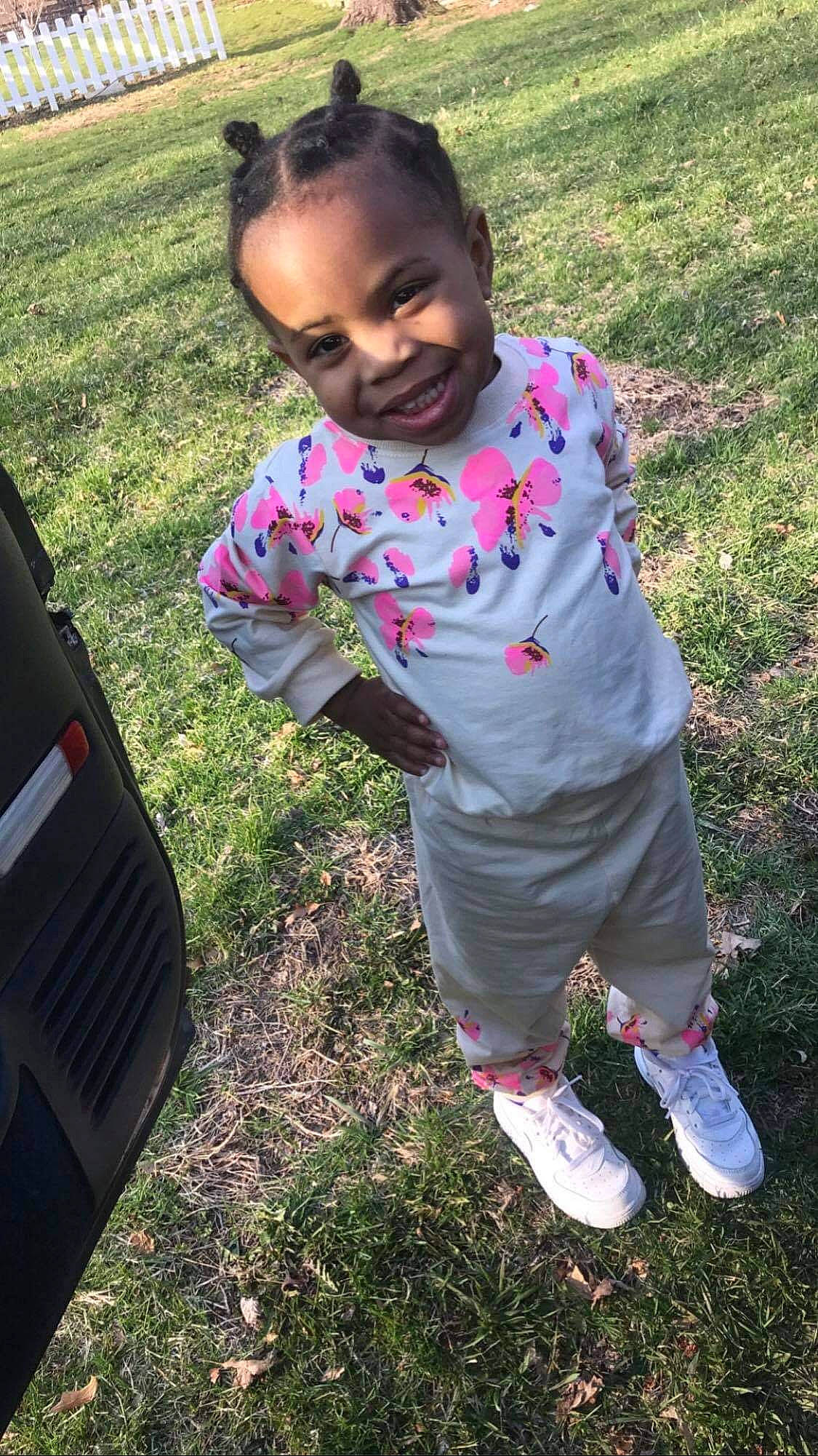 Amirah joined the competition — help win amazing prizes! automotive_lighting, baby_toddler_clothing, bumper, child, fun, grass, happy, joy, lawn, leaf, leisure, magenta, people_in_nature, person, pink, plant, recreation, sleeve, smile, soil