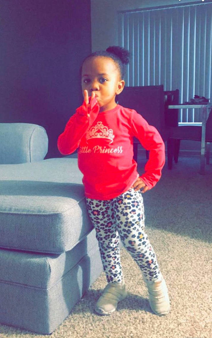 Amirah is registered to the contest to win money with this photo: baby_toddler_clothing, electric_blue, eye, face, fashion_design, flooring, fun, happy, human_leg, knee, magenta, neck, pajamas, pattern, person, shoulder, sleeve, t_shirt, thigh, toddler