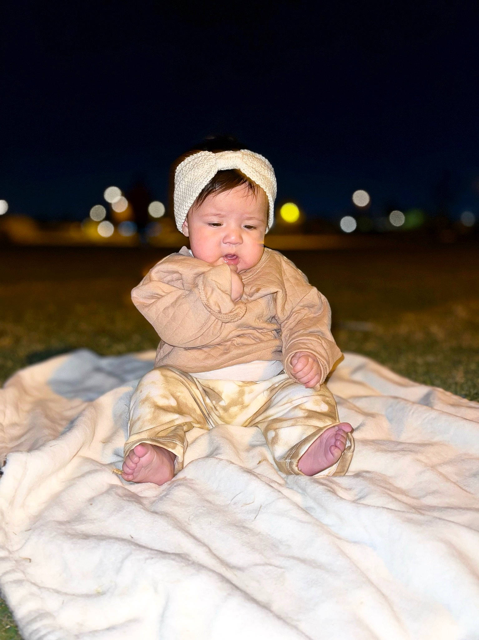 Alaina joined the competition — help win amazing prizes! baby, baby_toddler_clothing, child, comfort, face, flash_photography, fun, fur, grass, happy, headgear, peach, people_in_nature, person, portrait_photography, sitting, sky, sleeve, toddler, vacation