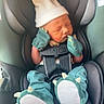 Cole is registered to the contest to win money with this photo: newborn, baby, sleeping, car_seat, infant, hat, mittens, dinosaur_booties, teal_clothing, seatbelt, harness, portrait, indoor, vehicle, cozy, peaceful, closed_eyes, infant_carrier, baby_clothing, cute