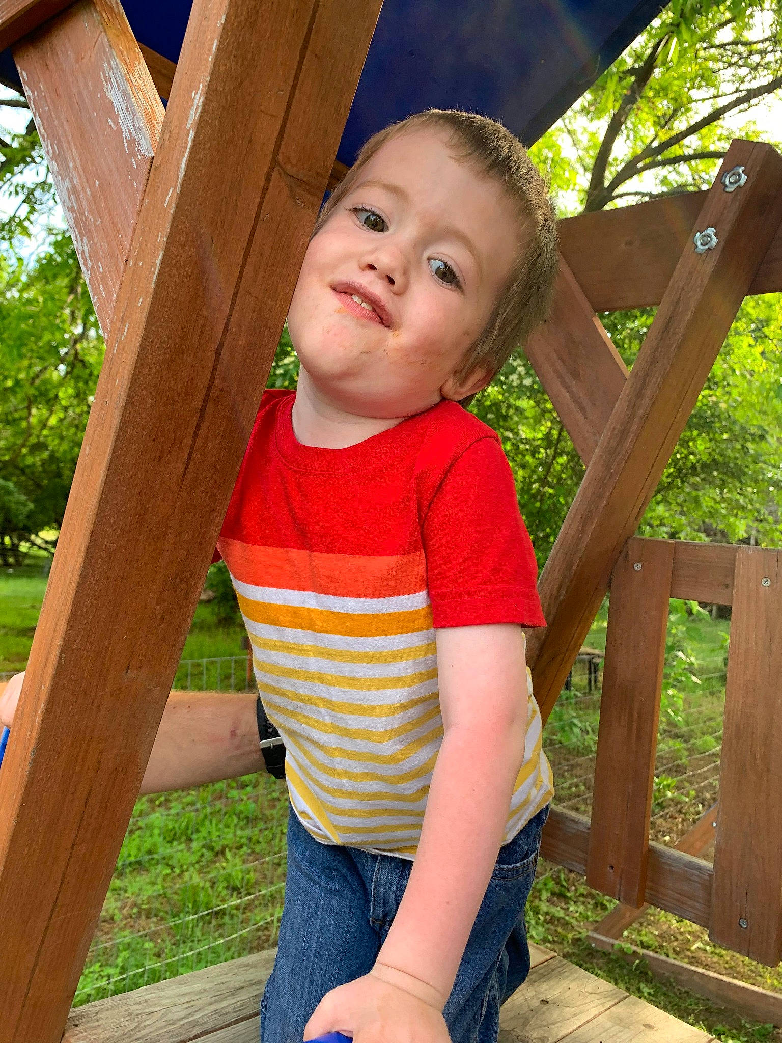 Joseph joined the competition — help win amazing prizes! baby_toddler_clothing, child, fun, grass, happy, leisure, outdoor_play_equipment, people_in_nature, person, plant, recreation, sitting, sleeve, smile, standing, summer, swing, t_shirt, toddler, tree