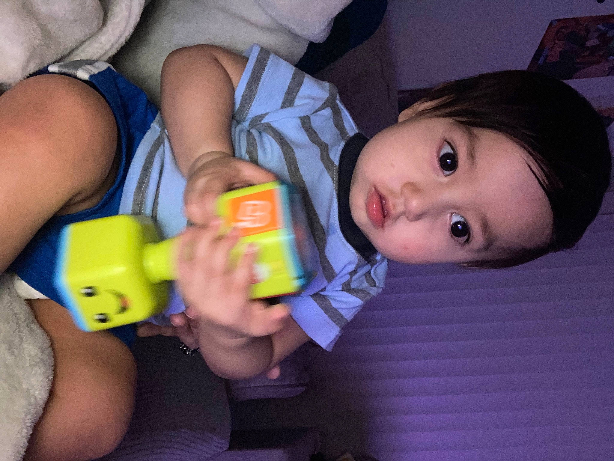 Jeremiah joined the competition — help win amazing prizes! baby_products, cheek, child, finger, fun, happy, human_leg, iris, mouth, nail, nose, person, plastic_bottle, room, sitting, skin, thigh, thumb, toddler, toy