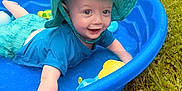 Rowan is registered to the contest to win money with this photo: baby, child, pool, blue, hat, sunhat, grass, outdoor, smile, happy, toy, water, splash, summer, play, toddler, clothing, cute, fun, sun
