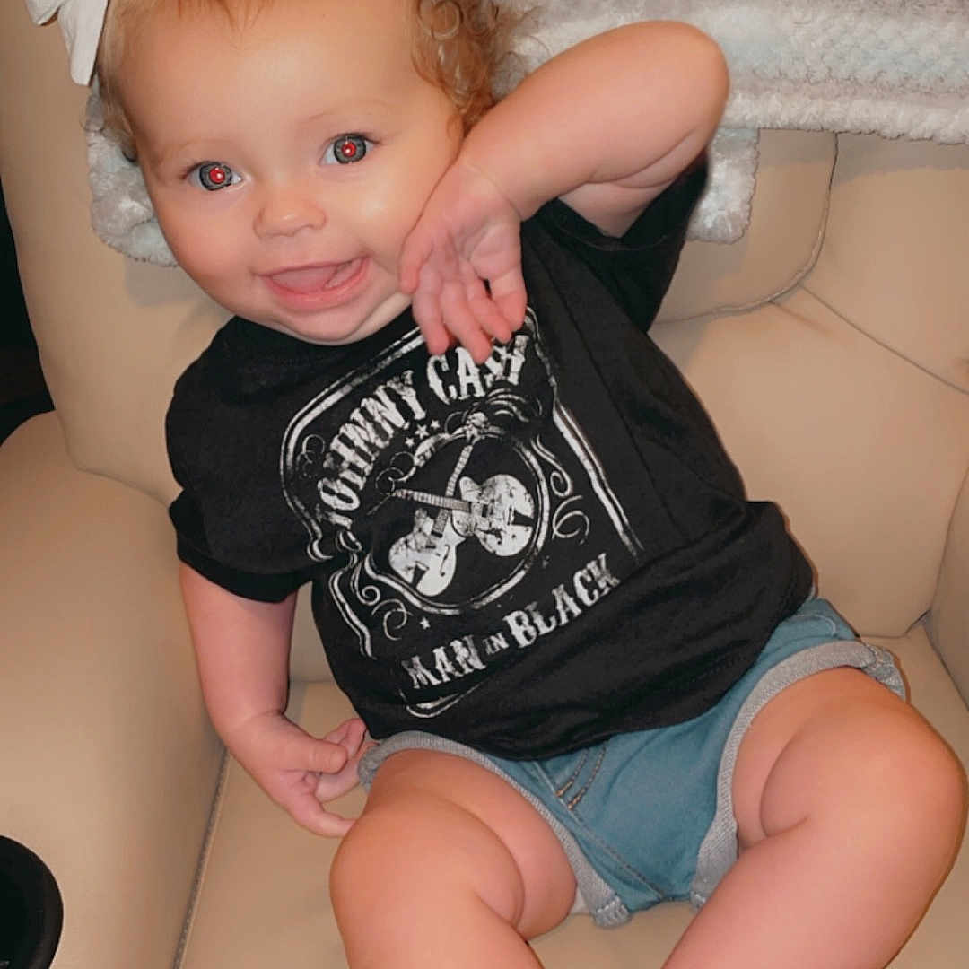Whitley joined the competition — help win amazing prizes! baby, bodypart, chair, clothing, couch, cushion, face, finger, furniture, hand, head, homedecor, indoors, pants, person, photography, portrait, shorts, sitting, t_shirt