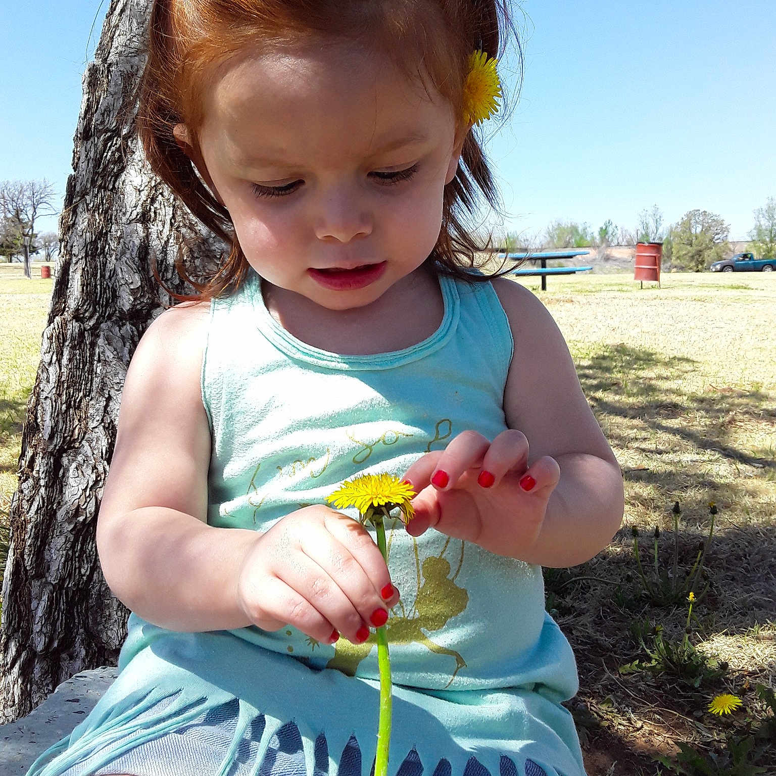 Nevaeha is registered to the contest to win money with this photo: baby, child, eating, finger, grass, happy, person, play, smile, summer, toddler, tree, vacation
