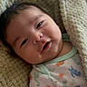 Ayden joined the competition — help win amazing prizes! baby, blanket, child, comfort, cute, dinosaur_print, face, hair, happy, indoors, infant, knit, onesie, portrait, resting, skin, sleepy, smile, soft_light, toddler