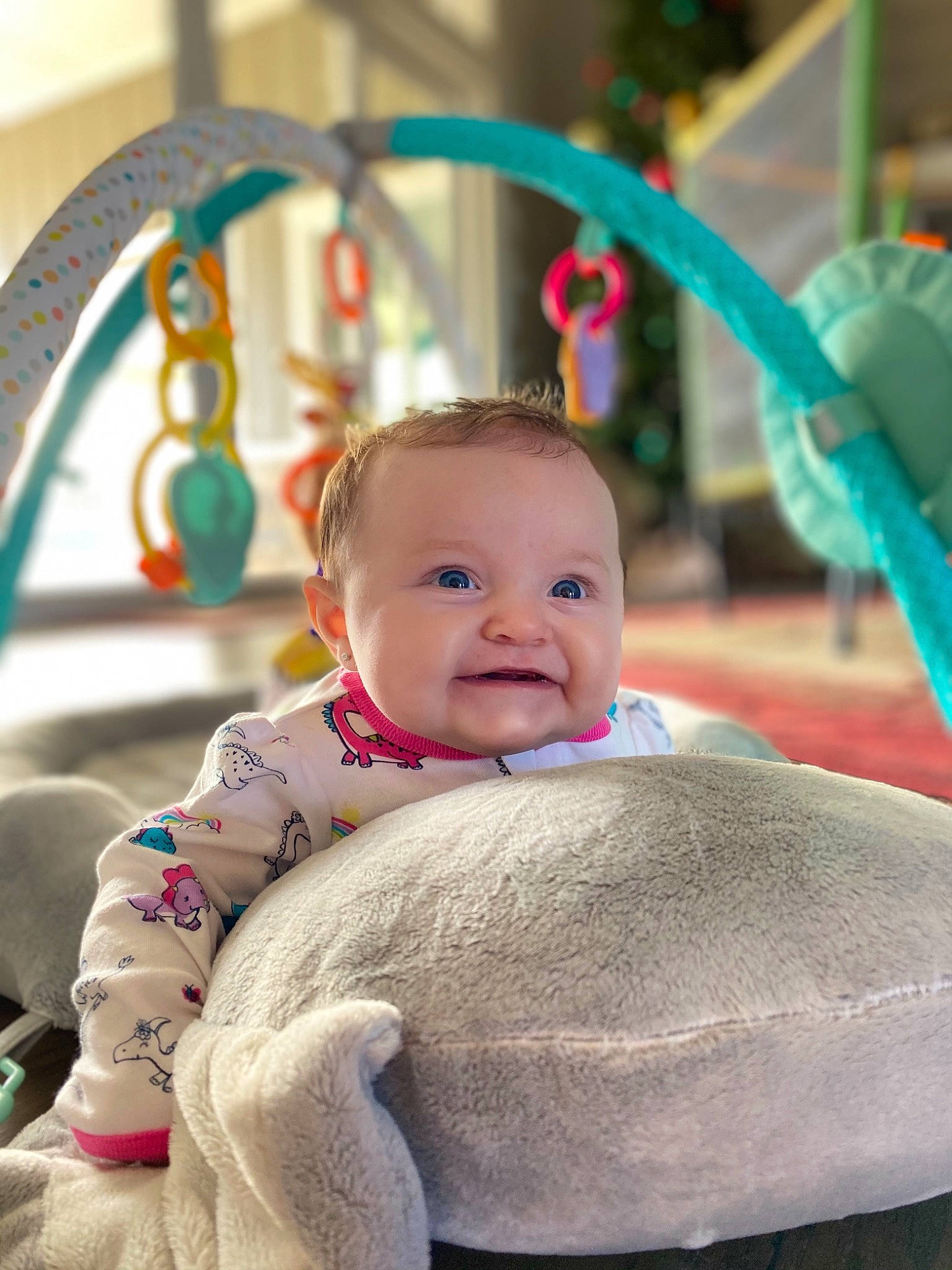 Ryleigh joined the competition — help win amazing prizes! aqua, baby, baby_laughing, baby_mobile, baby_products, baby_safety, baby_toddler_clothing, baby_toys, cheek, child, comfort, eye, joy, laugh, person, pink, product, teal, toddler