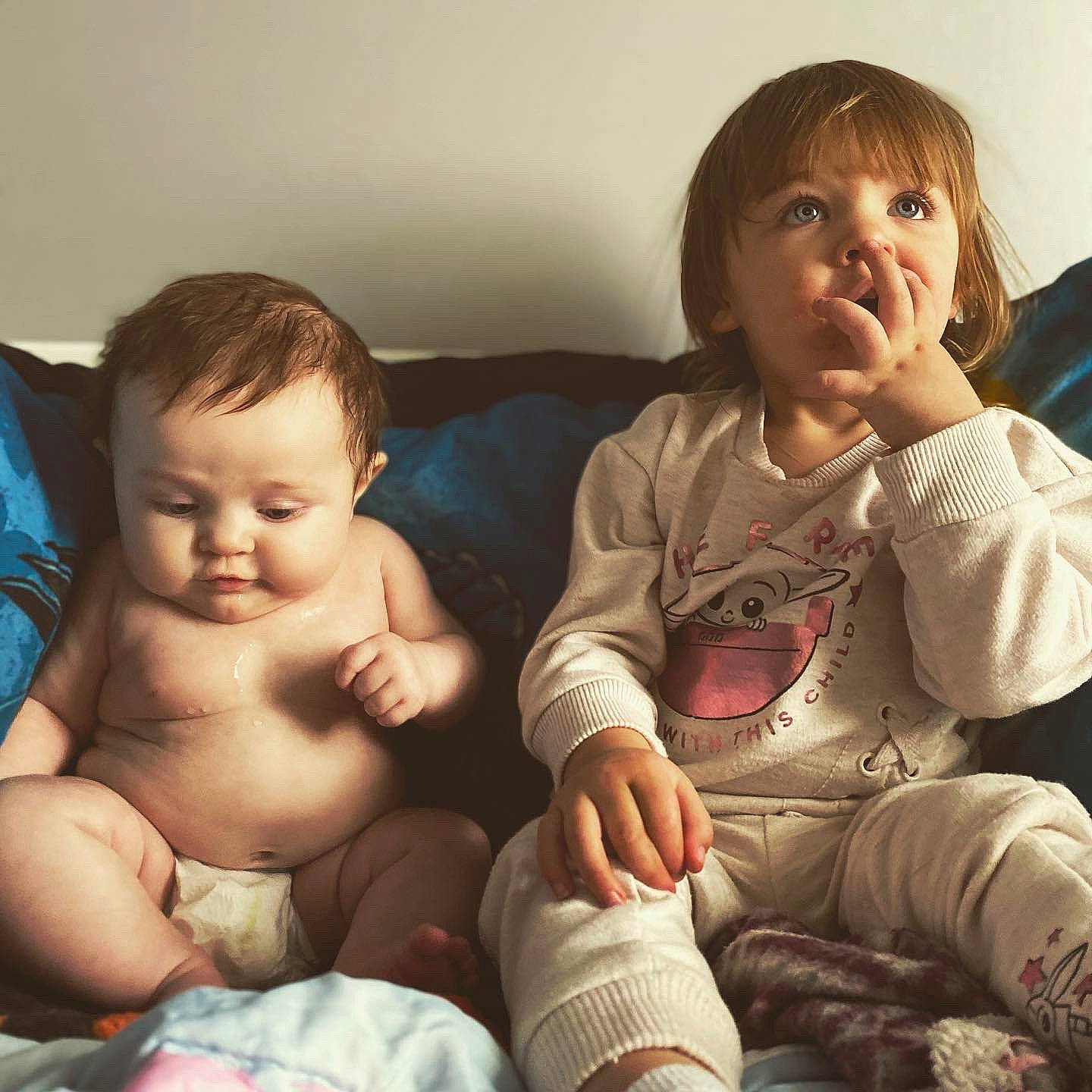 Ryleigh joined the competition — help win amazing prizes! abdomen, baby, baby_toddler_clothing, cheek, chest, child, comfort, eye, face, head, human, human_body, mouth, nose, person, sitting, skin, sock, stomach, toddler