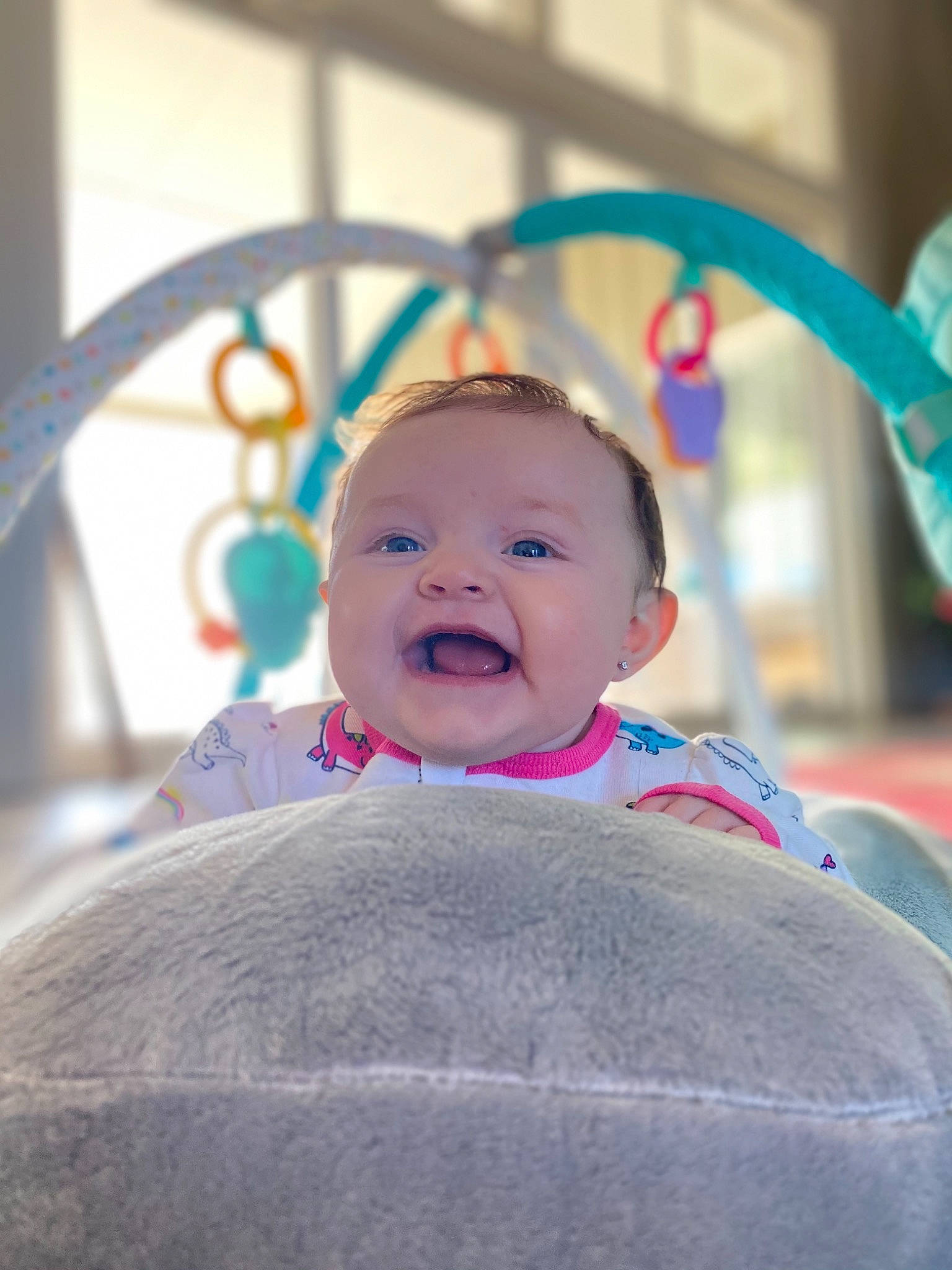 Ryleigh joined the competition — help win amazing prizes! aqua, baby, baby_laughing, baby_products, baby_safety, baby_toddler_clothing, baby_toys, cheek, child, facial_expression, iris, laugh, lip, nursery, organ, person, pink, product, skin, toddler
