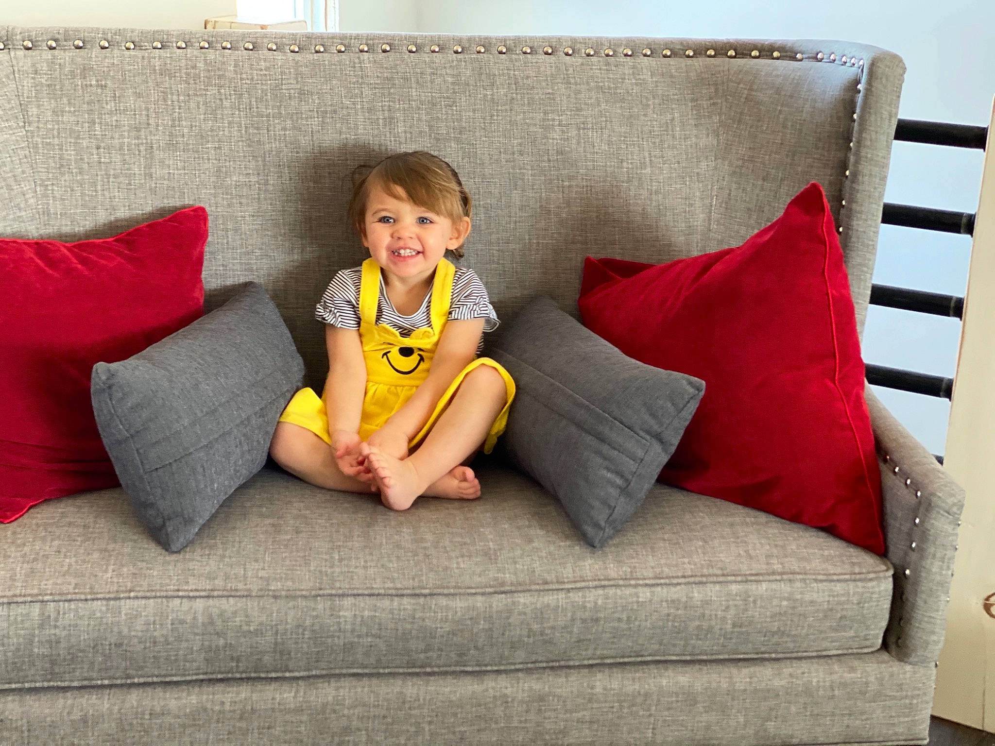 Emmalynn is registered to the contest to win money with this photo: comfort, couch, cushion, home, home_accessories, human, human_body, interior_design, joy, lap, laugh, living_room, person, pillow, rectangle, sitting, sofa_bed, studio_couch, throw_pillow, tooth