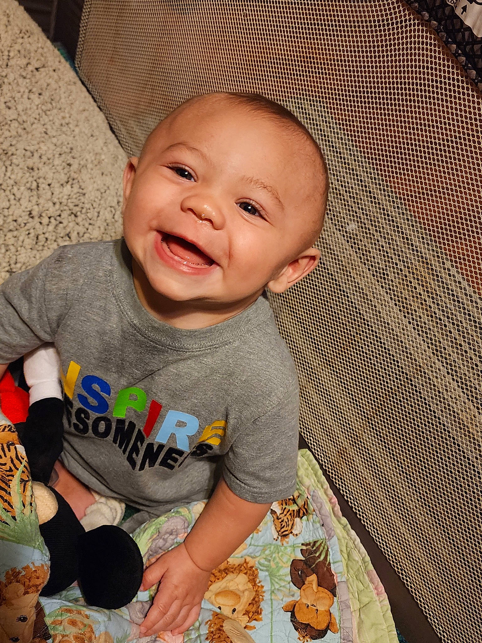 Justin is registered to the contest to win money with this photo: baby, baby_products, baby_toddler_clothing, beauty, cheek, child, comfort, facial_expression, flooring, hairstyle, happy, linens, mouth, nose, person, product, skin, sleeve, smile, textile