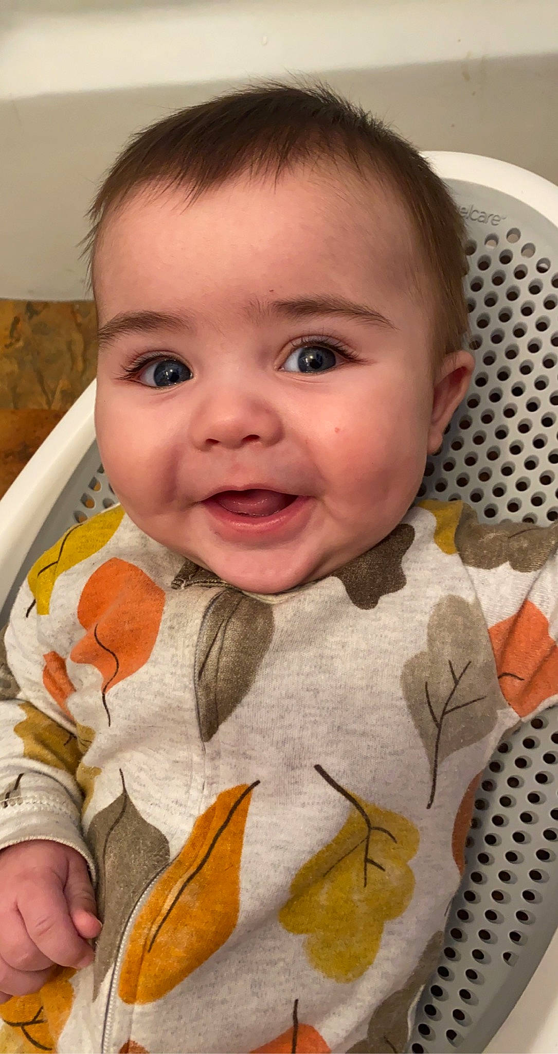 Henley is registered to the contest to win money with this photo: baby, baby_toddler_clothing, cheek, chin, eye, eyebrow, eyelash, facial_expression, forehead, happy, head, iris, lip, mouth, neck, nose, person, skin, sleeve, smile