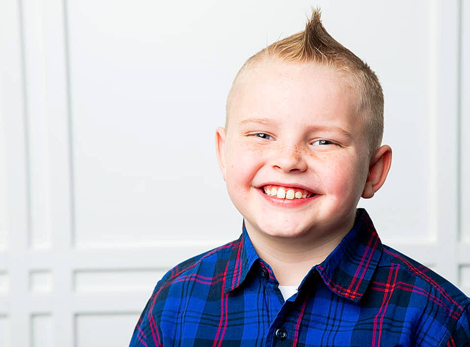 Stetson joined the competition — help win amazing prizes! blue, cheek, child, child_model, chin, design, ear, face, facial_expression, forehead, hair, hairstyle, happy, head, joy, laugh, pattern, person, plaid, portrait_photography