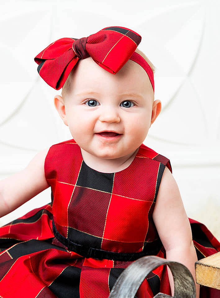 Nayvie is registered to the contest to win money with this photo: baby, baby_products, baby_toddler_clothing, child, child_model, costume, face, fashion_accessory, hair_accessory, head, headband, headgear, outerwear, person, photography, product, red, smile, toddler