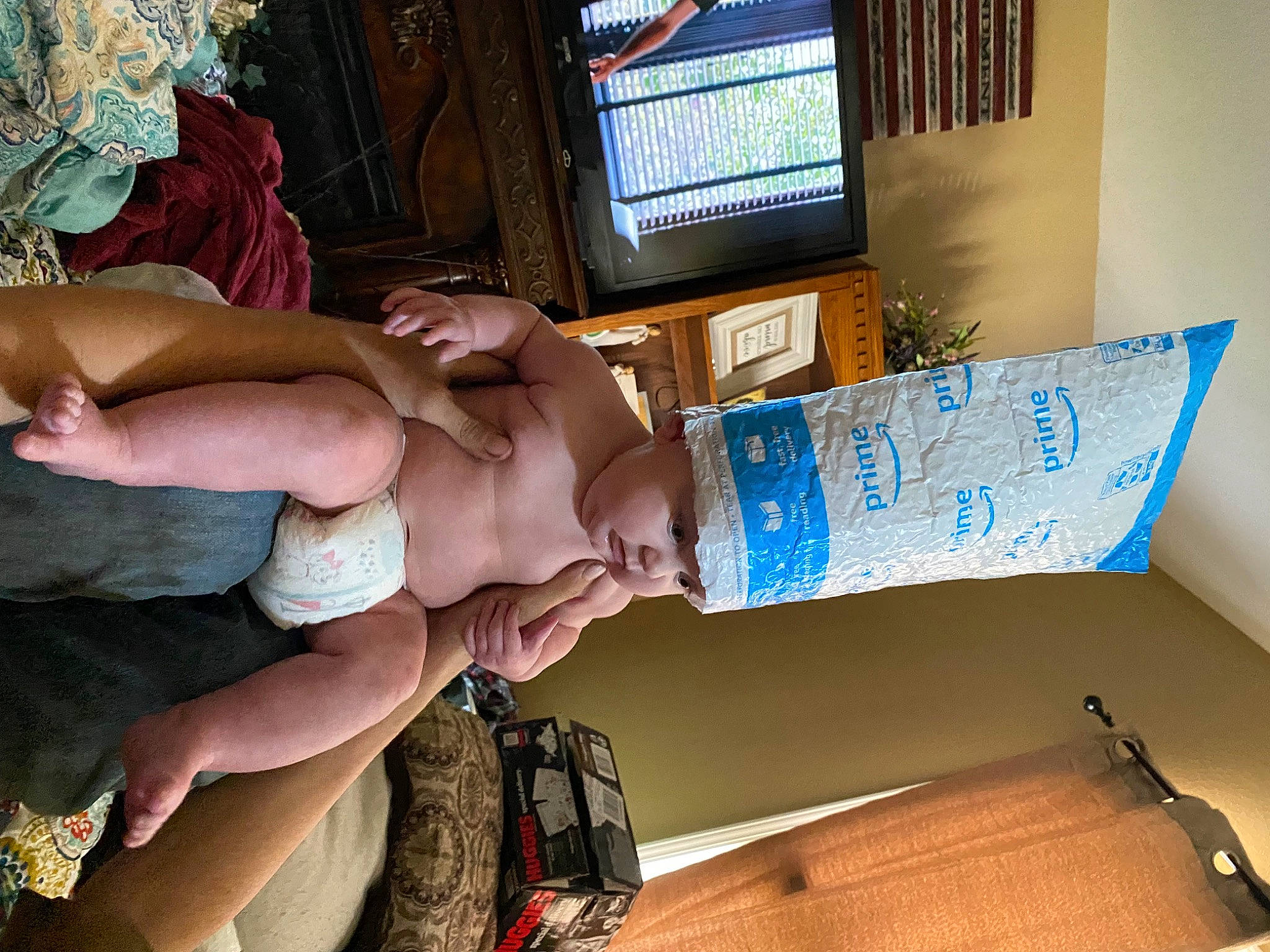 Brynnleigh is registered to the contest to win money with this photo: backpack, bag, chest, comfort, display_device, elbow, finger, foot, fun, gesture, headwear, human_leg, leg, luggage_and_bags, nail, person, room, television, thigh, thumb