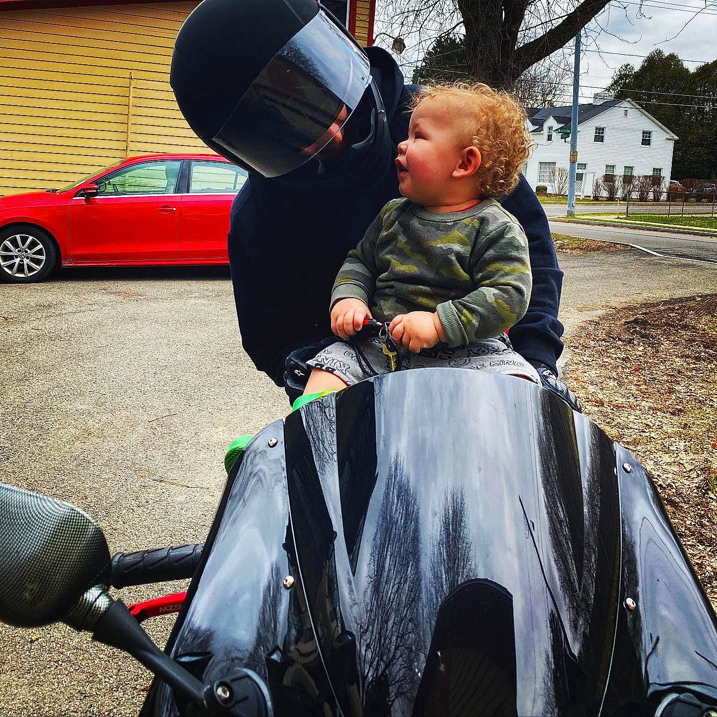 Cash joined the competition — help win amazing prizes! asphalt, automotive_design, automotive_exterior, automotive_lighting, automotive_tire, automotive_wheel_system, baby_carriage, car, grass, land_vehicle, motor_vehicle, person, personal_luxury_car, plant, tints_and_shades, tire, toddler, tree, vehicle, vehicle_door