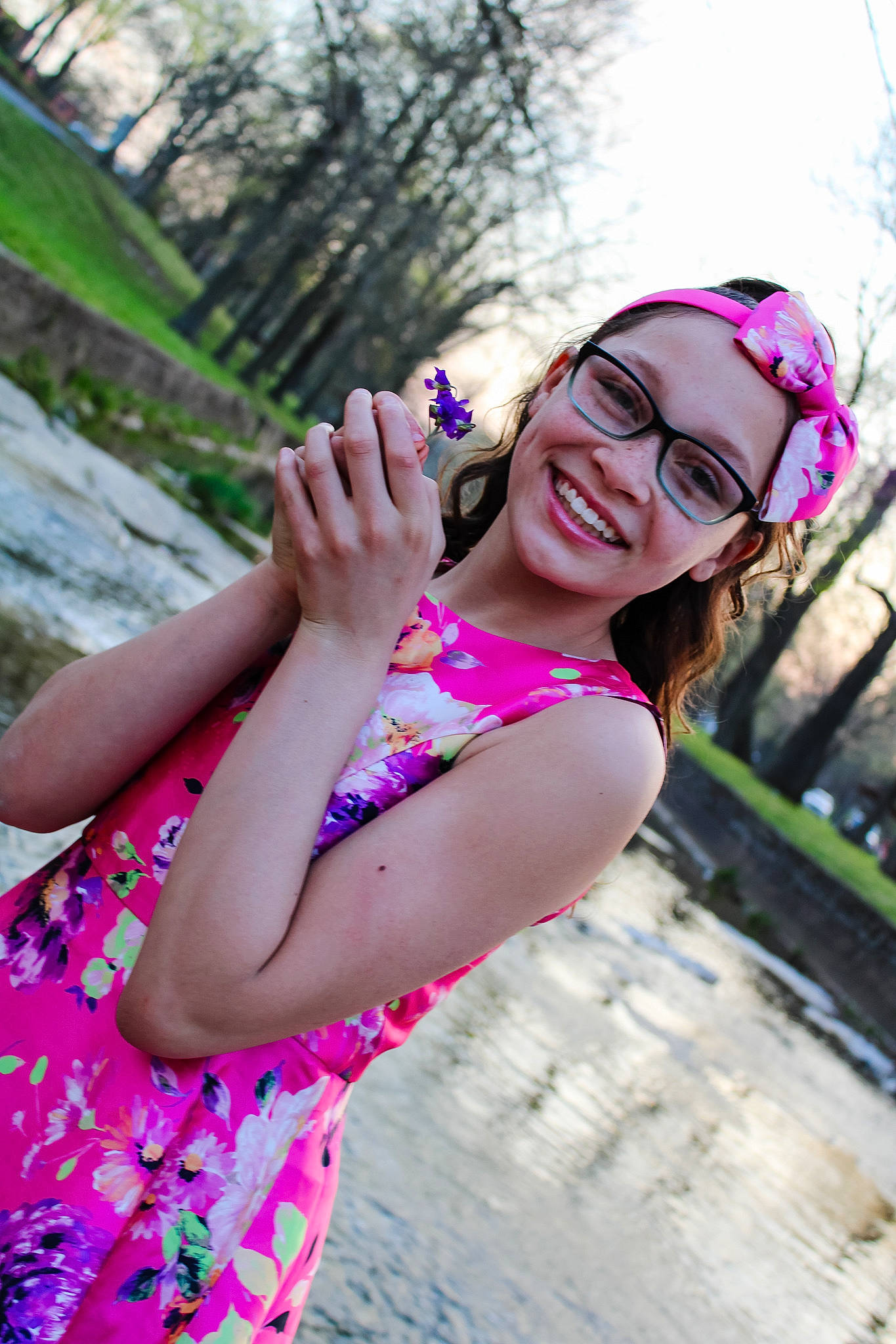 Tasia is registered to the contest to win money with this photo: arm, black_hair, cool, eyewear, flash_photography, gesture, glasses, grass, happy, headwear, joy, leisure, lip, people_in_nature, person, pink, plant, skin, sky, smile